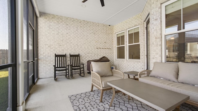 sunroom / solarium with ceiling fan