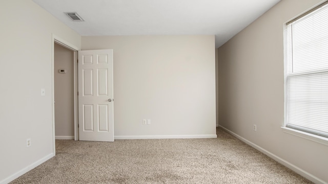 view of carpeted spare room