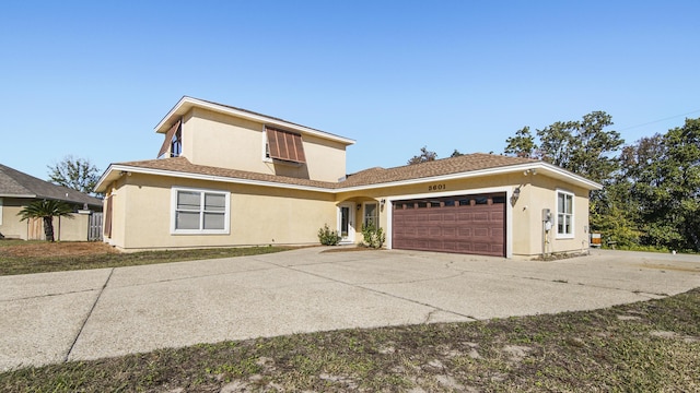 view of front of property featuring a garage