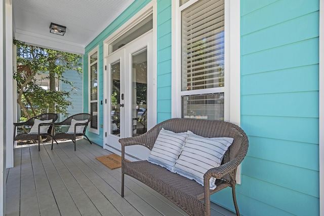 deck featuring french doors and a porch