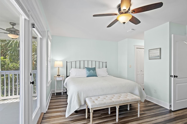 bedroom with dark wood-type flooring, a closet, and ceiling fan