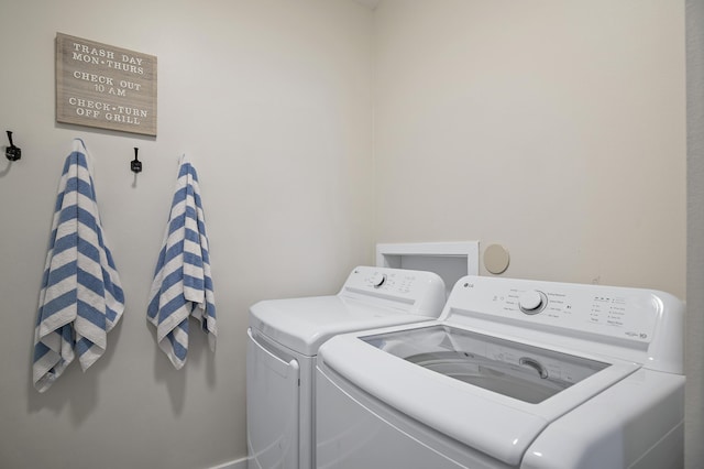 laundry area with washer and clothes dryer