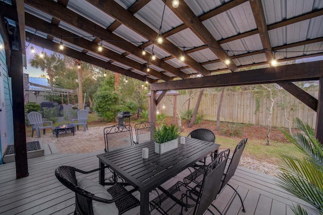 deck featuring an outdoor fire pit