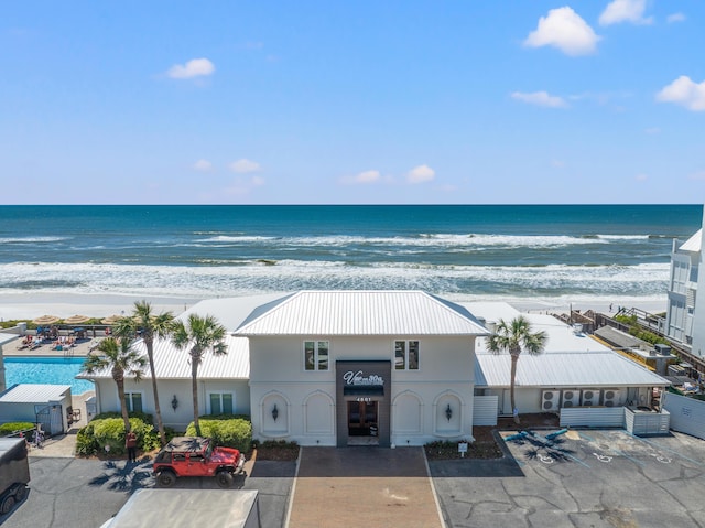 property view of water featuring a beach view