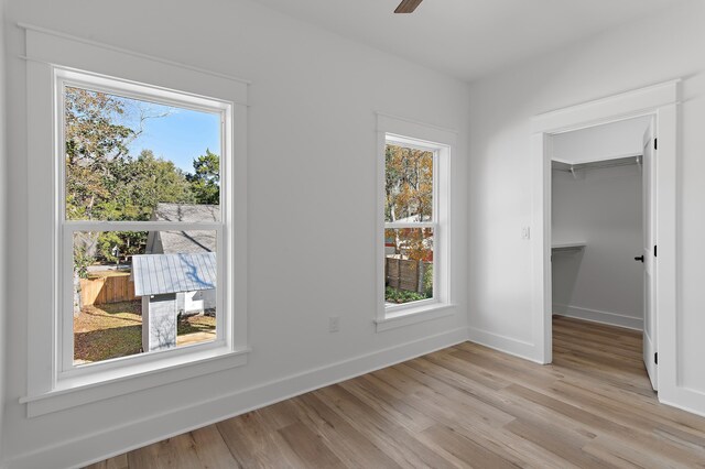 interior space featuring ceiling fan and light hardwood / wood-style flooring