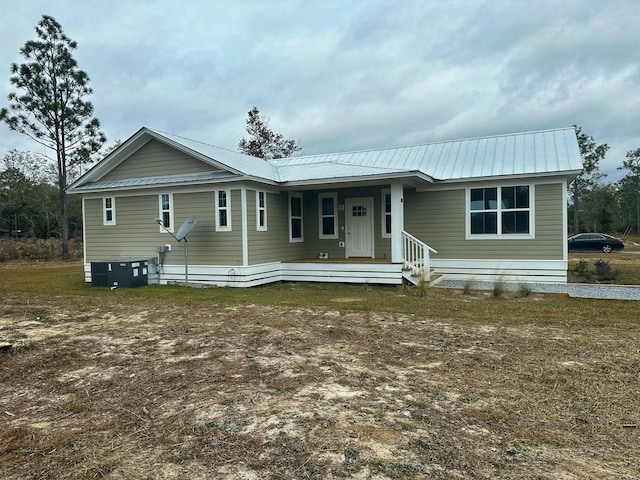 view of front of property with cooling unit