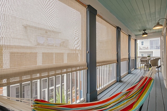 wooden terrace with ceiling fan