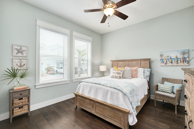 bedroom featuring dark hardwood / wood-style floors and ceiling fan