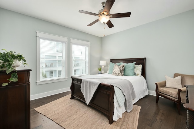 bedroom featuring ceiling fan and dark wood-type flooring