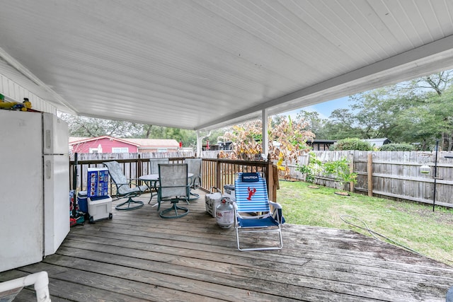 deck featuring a lawn