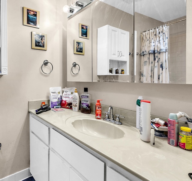 bathroom featuring vanity and walk in shower