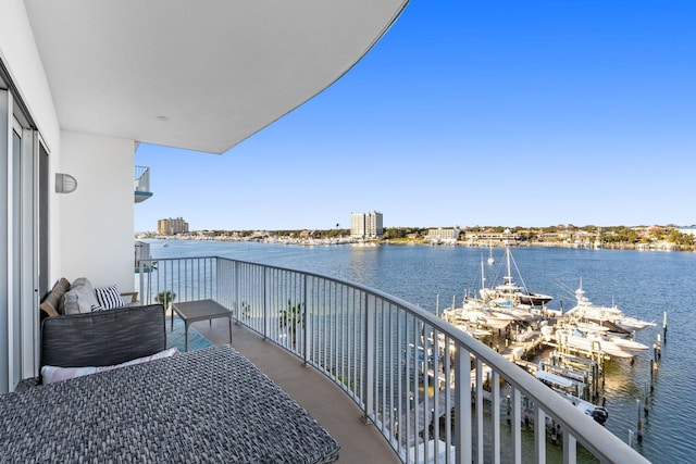 balcony featuring a water view