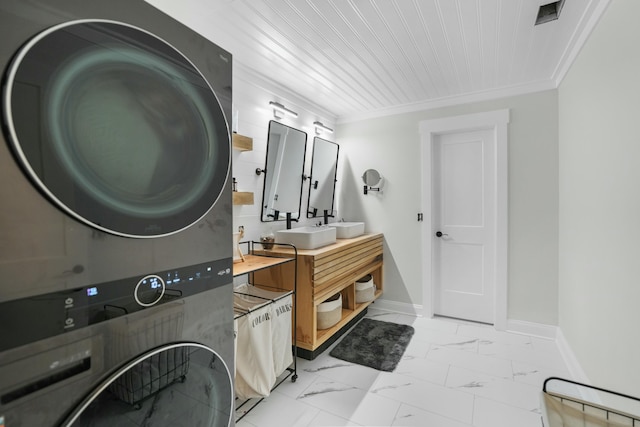 bathroom with vanity, ornamental molding, stacked washer / dryer, and wood ceiling