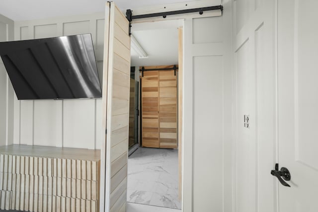 hallway with a barn door