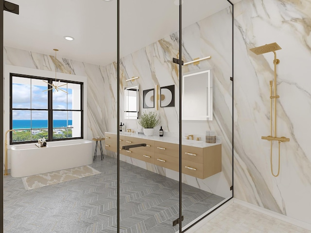 bathroom featuring vanity, a water view, and separate shower and tub