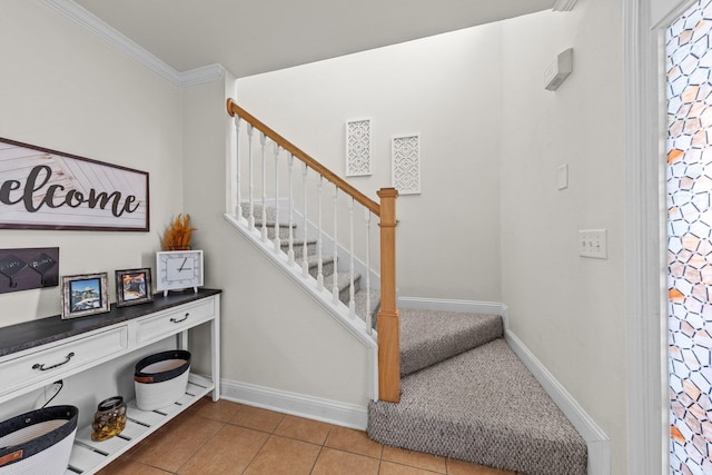 789 Majestic Dr, Crestview, FL 32536 - staircase with baseboards, crown molding, and tile patterned flooring