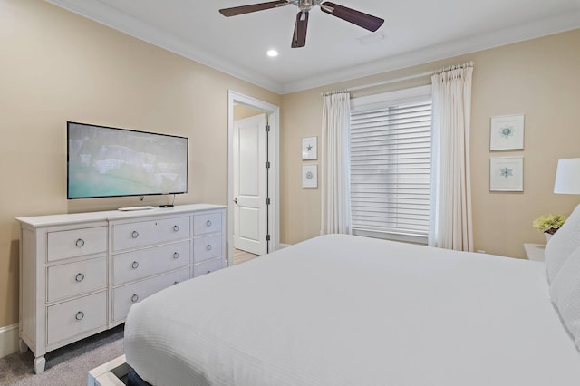 bedroom featuring light carpet, ceiling fan, and crown molding