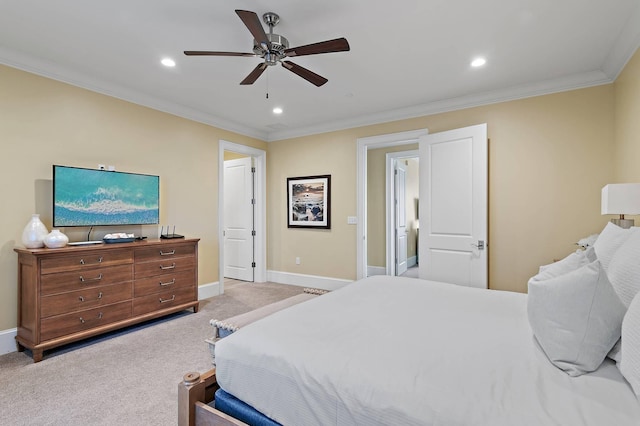 carpeted bedroom with ceiling fan and ornamental molding