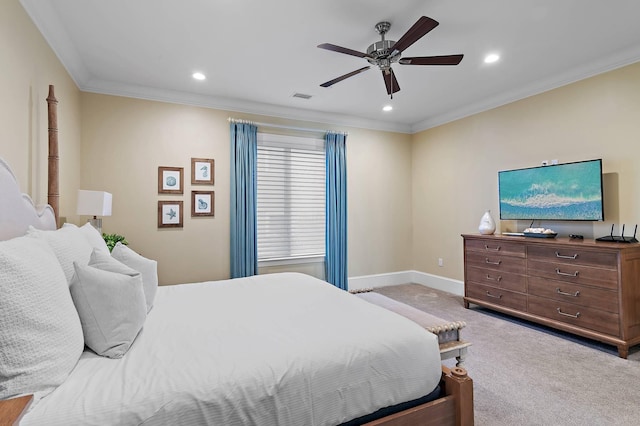 carpeted bedroom featuring ceiling fan and ornamental molding