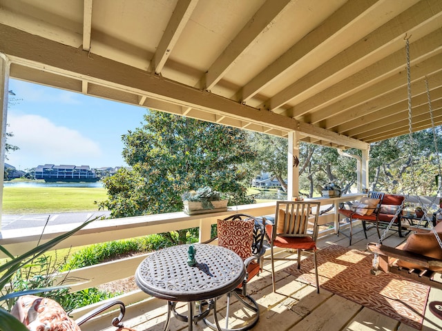 view of patio featuring a water view