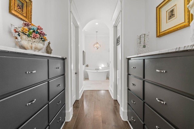 hallway featuring dark hardwood / wood-style floors