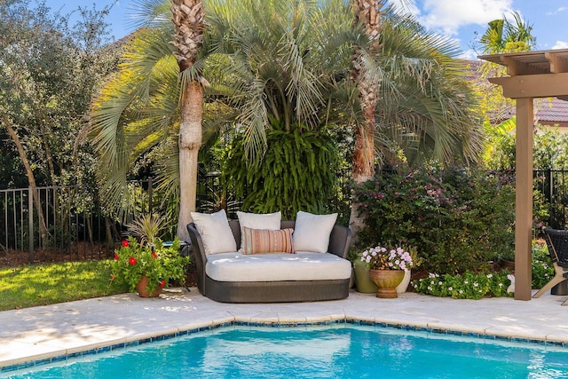 view of swimming pool with a patio area