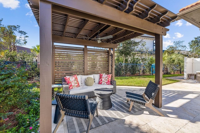 view of patio with outdoor lounge area, ceiling fan, and a pergola