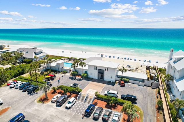 bird's eye view with a beach view and a water view