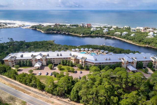 birds eye view of property featuring a water view