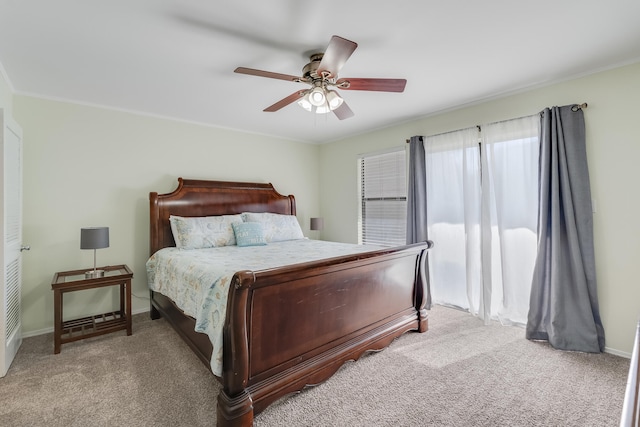 bedroom featuring ceiling fan and light carpet