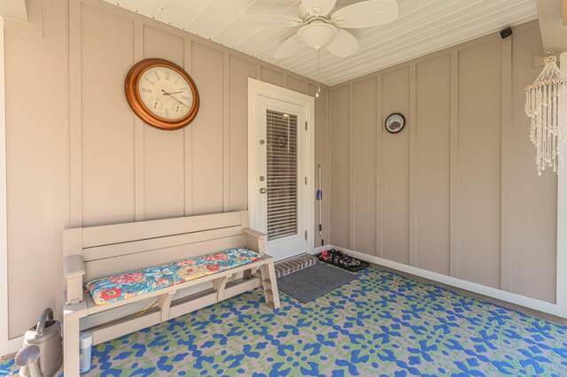 entrance to property with ceiling fan