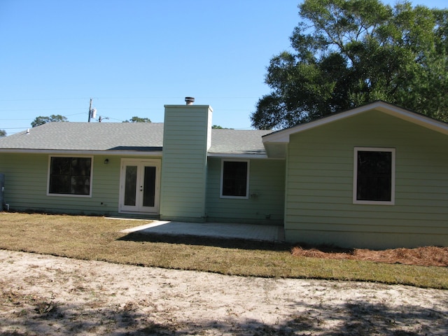 rear view of house with a patio