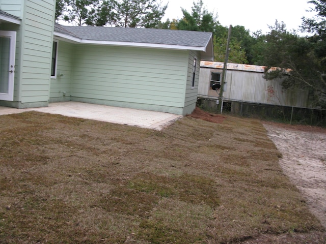 view of home's exterior with a patio area