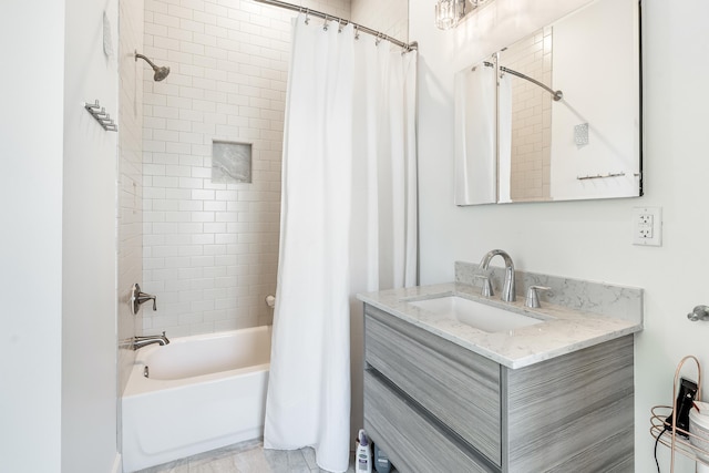 bathroom with vanity and shower / bath combo with shower curtain