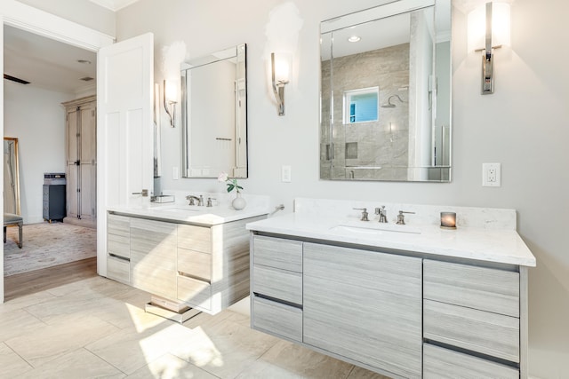 bathroom with a shower with door, vanity, and wood-type flooring