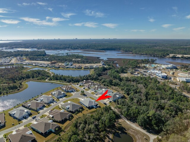 bird's eye view with a water view