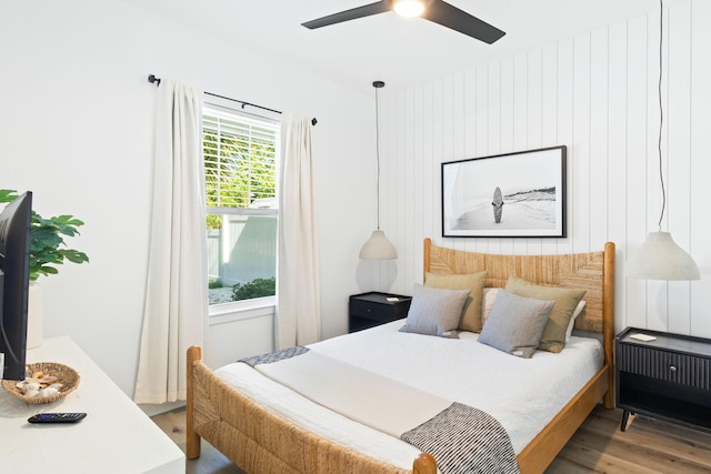 bedroom featuring ceiling fan and wood finished floors