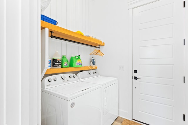 clothes washing area with laundry area and washing machine and dryer