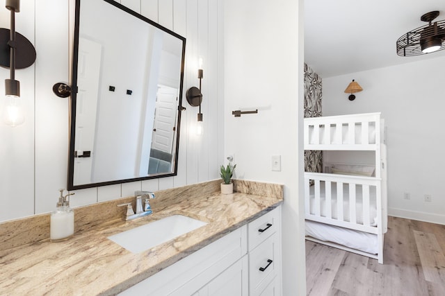 bathroom featuring vanity and wood finished floors