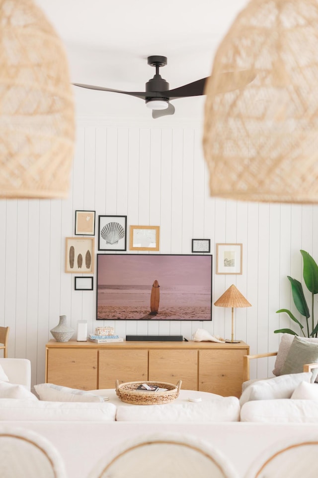 living room with a ceiling fan