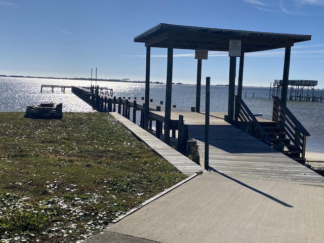 dock area with a water view