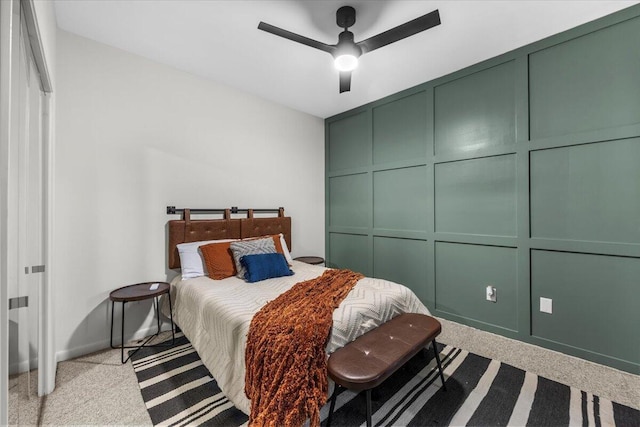 bedroom featuring ceiling fan and light colored carpet