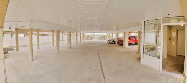 exterior space with a carport