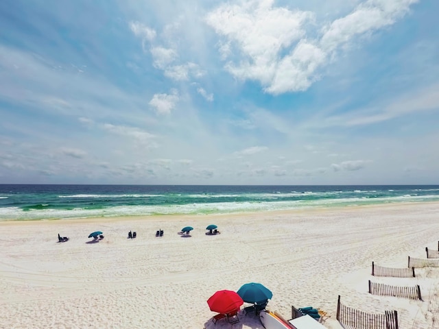 view of water feature with a beach view