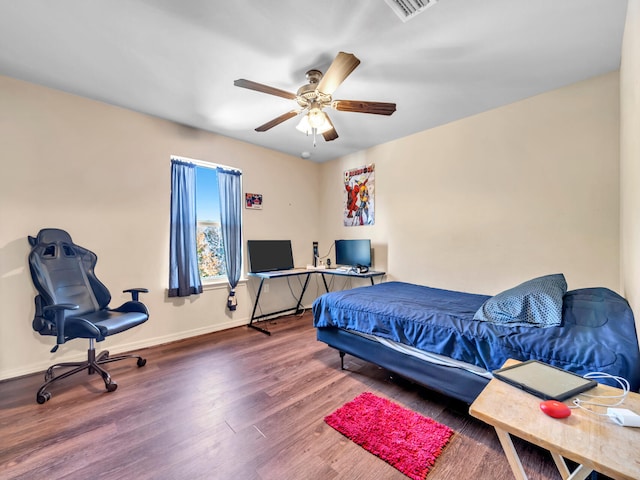 bedroom featuring ceiling fan and wood-type flooring