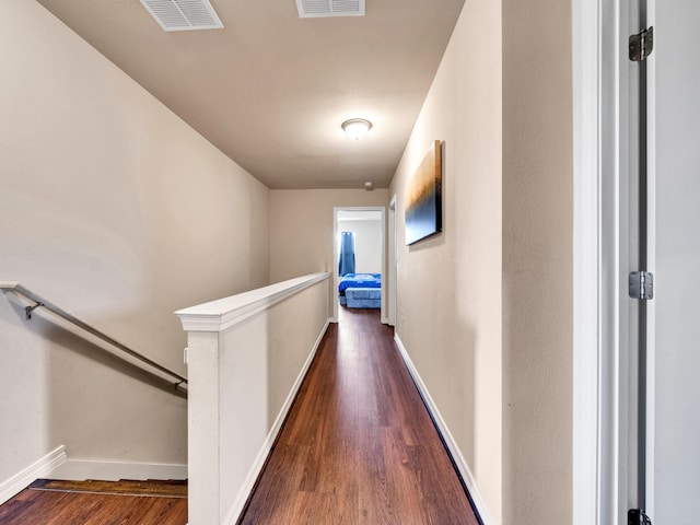 hallway featuring dark wood-type flooring