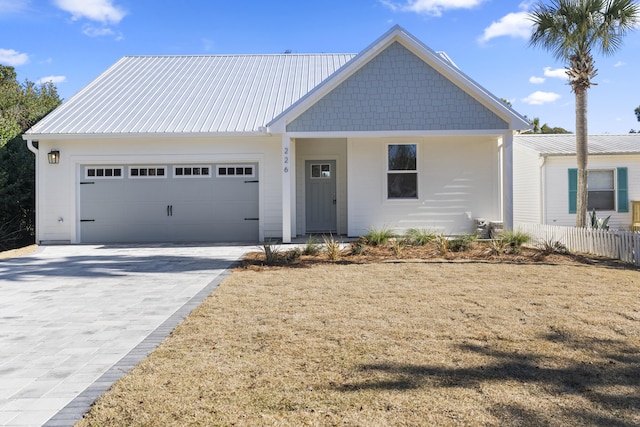 view of front of home with a garage