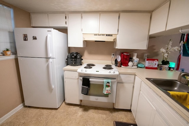 kitchen featuring white cabinetry, sink, and white appliances