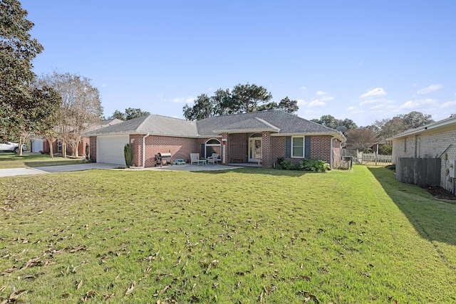 single story home featuring a front lawn and a garage