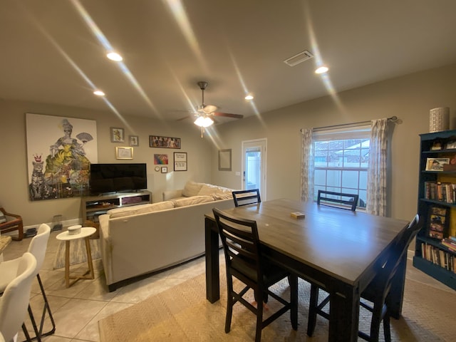 dining room featuring ceiling fan and light tile patterned floors